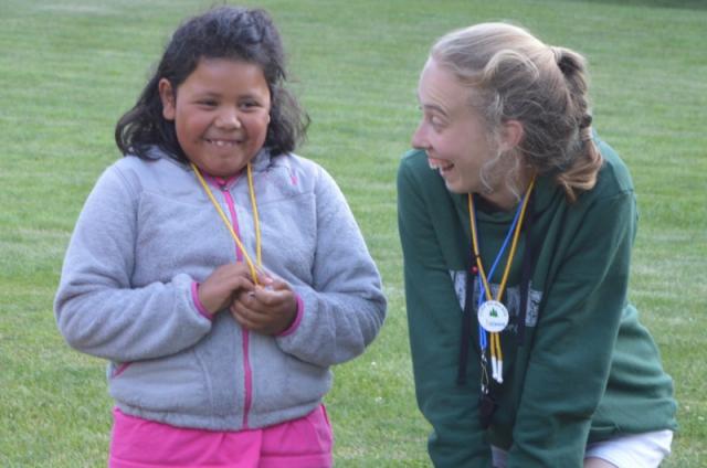 WeHaKee counselor helping camper